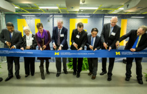 Group cutting ribbon at Nuclear Engineering Lab